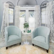 Gray Sitting Area With Blue Chairs