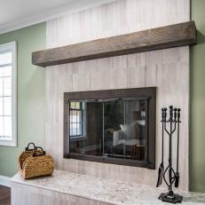 Brown Fireplace With Reclaimed Wood Mantel