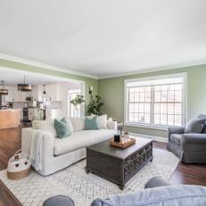 Green Transitional Living Room With Gray Chair