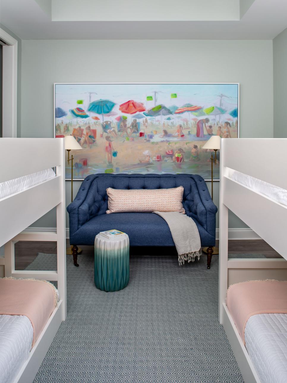 Guest Bedroom With Double Bunk Beds Beach Painting Hangs Above Tufted Sofa In Guest Bedroom With Bunk Beds