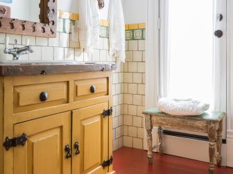 Mediterranean Bathroom With Yellow Vanity