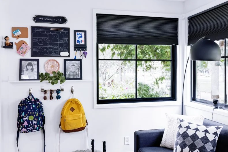 As you arrange elements like ledges, bulletin boards, and hooks, carefully consider who’ll be using it most. Keep hooks for kids’ backpacks and small coats at their height.  And if you want to control what's on the calendar, hang it high so that kids won't have easy access. 