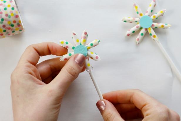 Glue on a lollipop stick, and you're ready to add the toppers to your sweet treat.