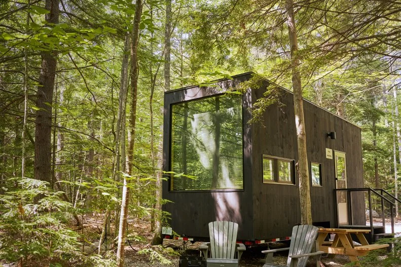 A fire pit, Adirondack chairs, firewood (provided for a small fee) and a picnic table offer plenty of enticement to get outside for a meal, a chat around the fire or some game time with friends.