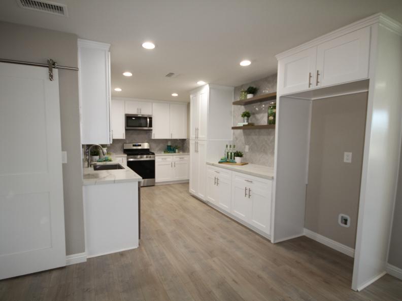 Bright white cabinets, updated appliances, and fresh countertops brighten up this kitchen in Orange, CA. As seen on HGTV's Flip or Flop.