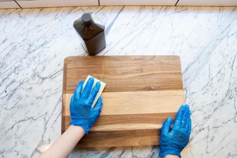 Sanitize a cutting board with hydrogen peroxide.
