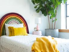 Twin Bed With Padded Rainbow Headboard