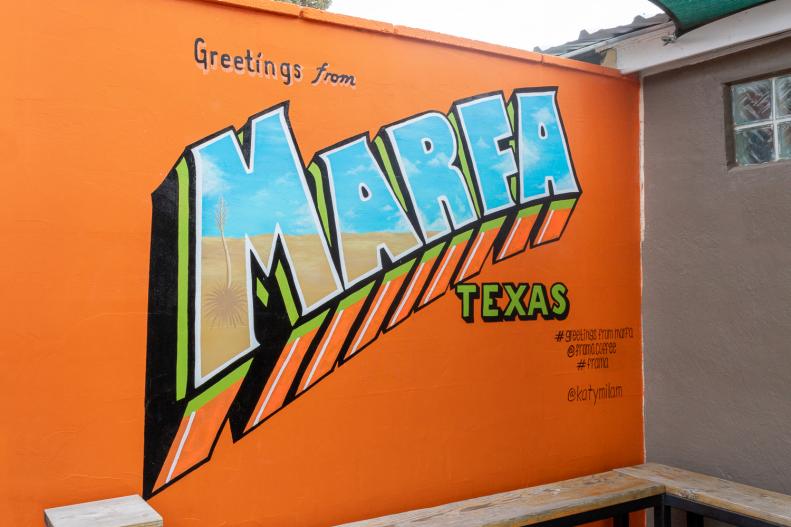 vintage-postcard-style Marfa mural in orange and blue