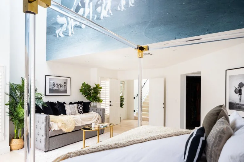 Breegan is quick to reference the bedroom as her favorite space in the house. “My bedroom is my private oasis space,” she says. “The black, white and gold accents are elegant and comforting every time I walk into the space.” It was also the hardest part of the renovation. “It had an open spiral loft in the middle of the room, and a giant change in ceiling height.” But with her expert design approach, everything worked out perfectly. “I took it as an opportunity to create an individual canvas for customized art,” she recalls. 