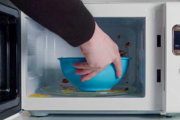 Add bowl of ingredients to the inside of the microwave for cleaning.