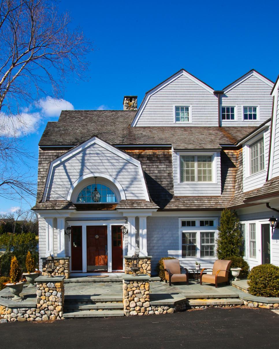 Front Exterior With Stone Patio Front Door and Stone Patio