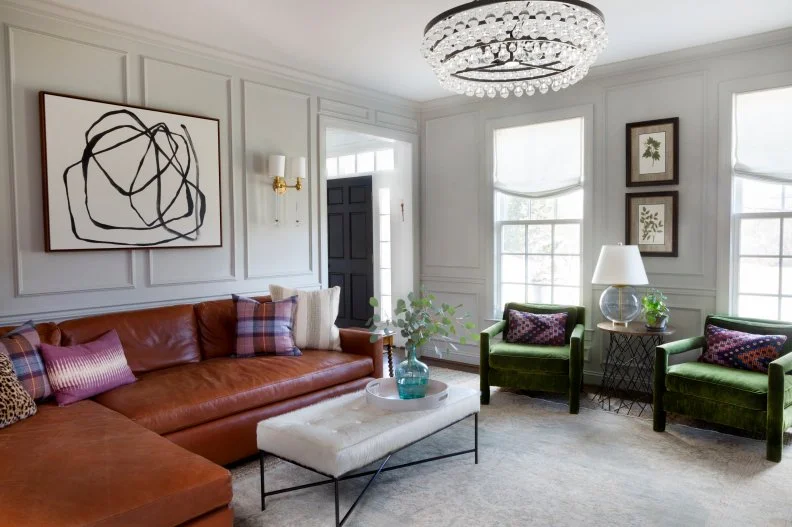 Designing this home involved tackling one room at a time over a number of years. When her clients first invited her into their 4,200 square foot, four-bedroom home, the couple was raising three children, all of whom have since moved into homes of their own. "The house has been renovated over time," Naomi recalls, "including two-and-a-half baths, the entry hall, living room, dining room, home office and master suite. We even added two fireplaces and enhanced the millwork throughout." 