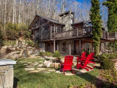 Rustic Backyard With Red Chairs