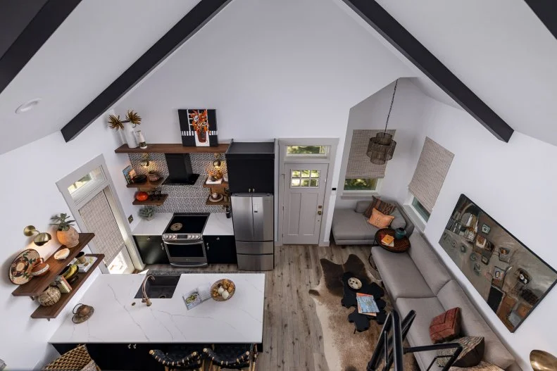 View From Loft Overlooks Small Kitchen, Marble Island, Sectional Sofa