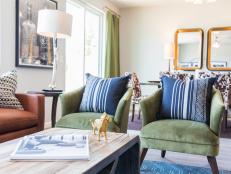 Green Velvet Armchairs and Blue Pillows