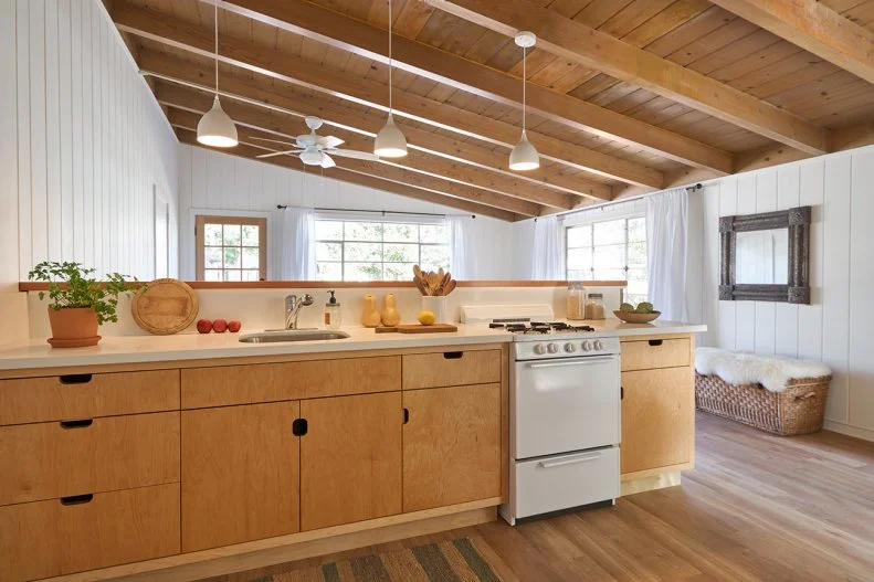 Modern Kitchen With Natural Wood Cabinets, Exposed Ceiling Beams