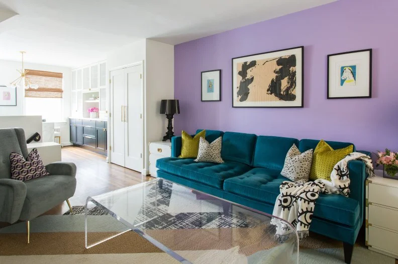 Modern Living Room, Velvet Sofa, Colorful Accent Wall Beside Kitchen