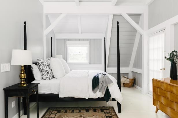 Main Bedroom With Black Four Poster Bed