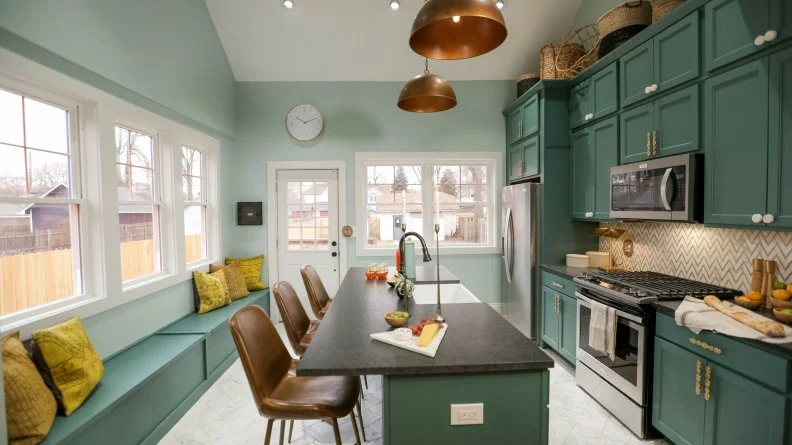 From 'Good Bones,' season 5. Designer Mina Starsiak and her mom Karen updated this kitchen as part of a challenging renovation on a Cincinnati bungalow. A simple window seat is a perfect addition for casual seating and kitchen entertaining.