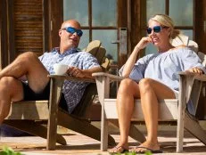 Bryan and Sarah relaxing on a deck