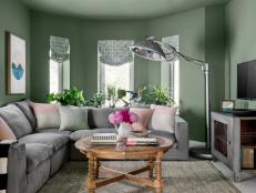 Gray Sectional Sofa Creates Cozy Sitting Nook in Green Living Room