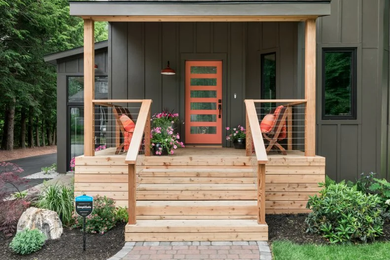 Natural Wood Steps and Porch Contrast Nicely With Gray House