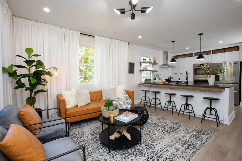 As seen on HGTV's Ty Breaker, the newly renovated living room and kitchen in the Barham home.