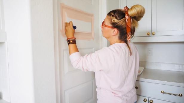 A Pantry Door is Coated With a Pink Paint