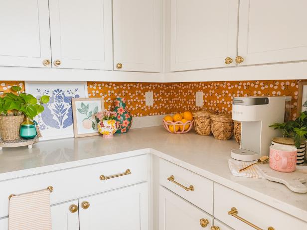 A Pantry With Colorful Wallpaper and Decor