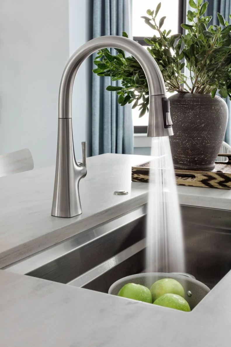 The fully customizable kitchen faucet can be programmed to your smartphone for a high-tech cooking experience.