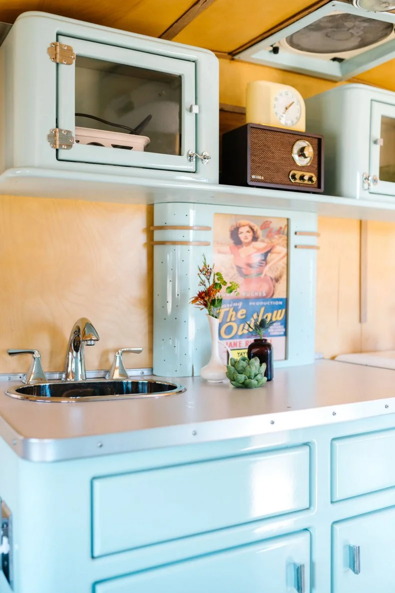 Kitchen With Blue Cabinets and Matching Appliances