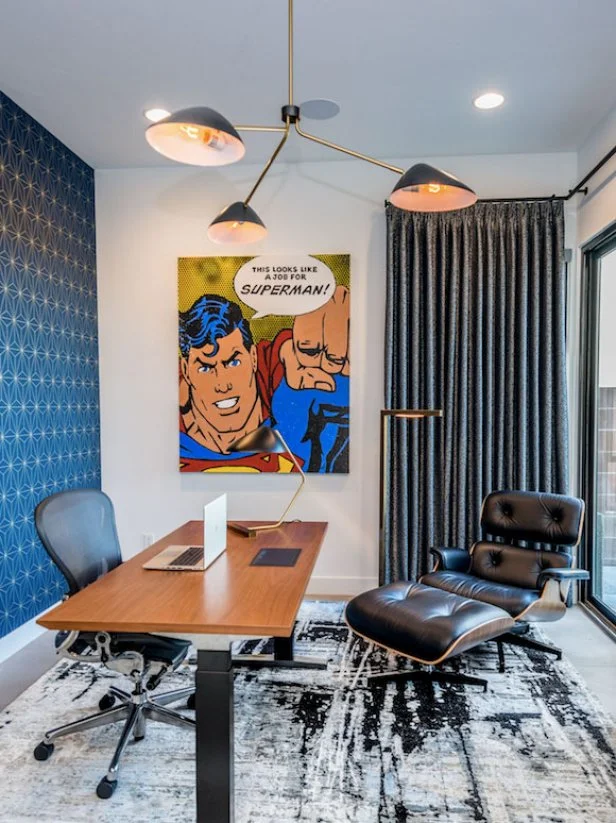 “The graphic starburst wallpaper, the Eames lounge chair, the slatted wood credenza, and the 3-arm metal ceiling fixture are modern takes on midcentury design,” says Missy Stewart, Principal Designer, Missy Stewart Designs in Houston, Texas.
