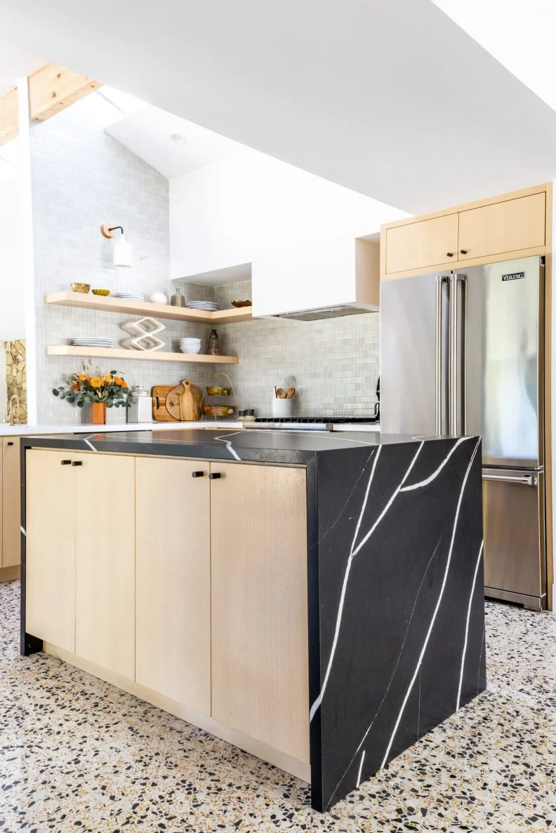 Kitchen Island Topped With a Waterfall Countertop