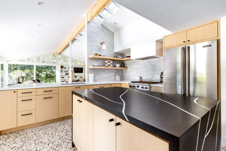 Kitchen With Vaulted Ceilings and Modern Cabinets