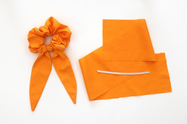 Feel free to make adjustments to this project. To make your scrunchie more voluminous, make your initial rectangle of fabric larger and your elastic shorter. For this example, our fabric rectangle measured 28” x 5” and our elastic measured 6.5”.