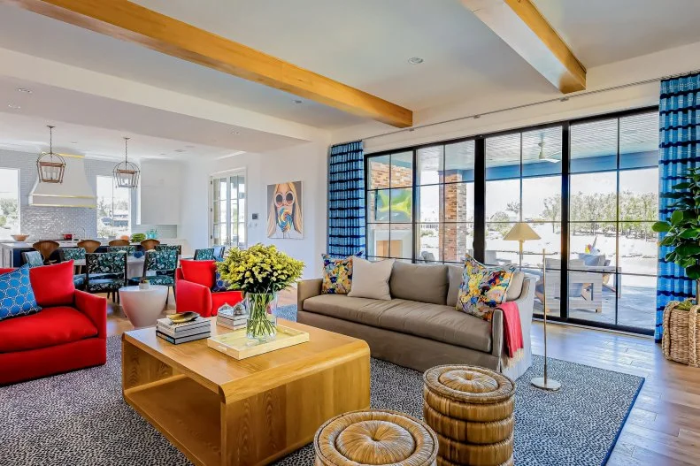 Panoramic Sliding Doors in Living Room, Red Sofas, Blue Curtains
