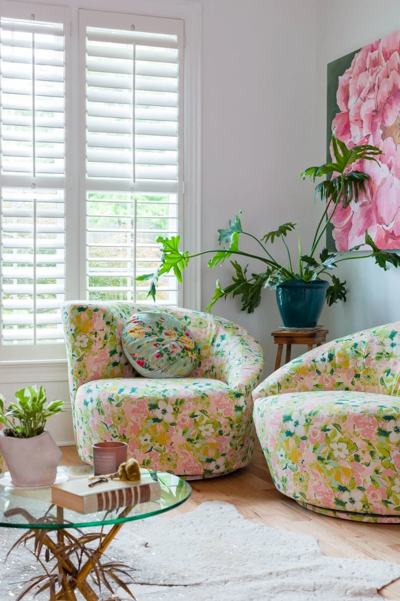 Bari Ackerman uses lots of floral prints as part of her "curated maximalism" decorating scheme at her Charlotte, North Carolina, home. By mixing patterns of different scales with geometric prints, Ackerman is able to use a variety of colors and patterns.