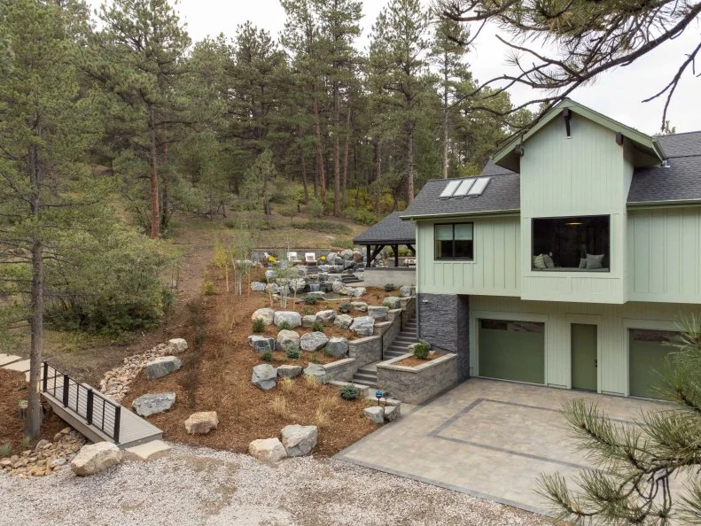 Green Exterior and Driveway