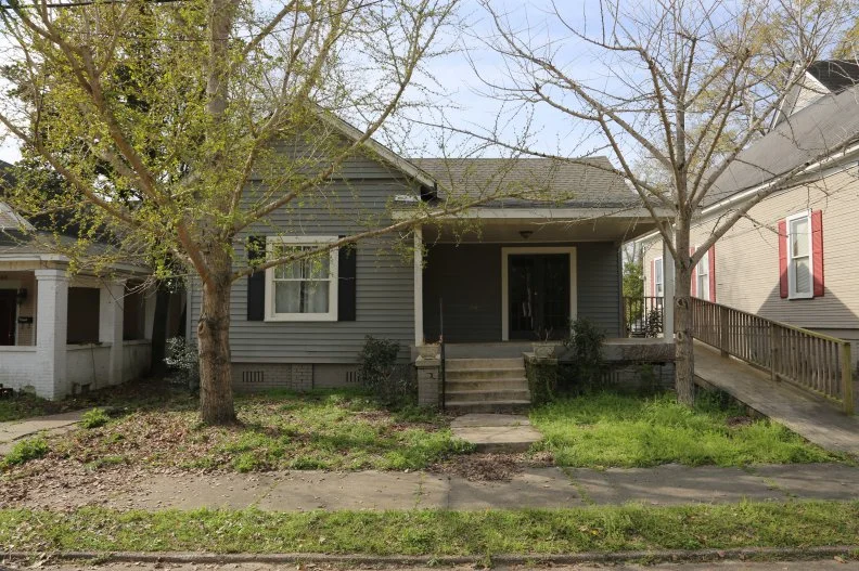 Ben and Erin will give the Parker House a fresh update by removing the existing wheelchair ramp, adding a wooden porch railing, and updating the exterior light fixture.