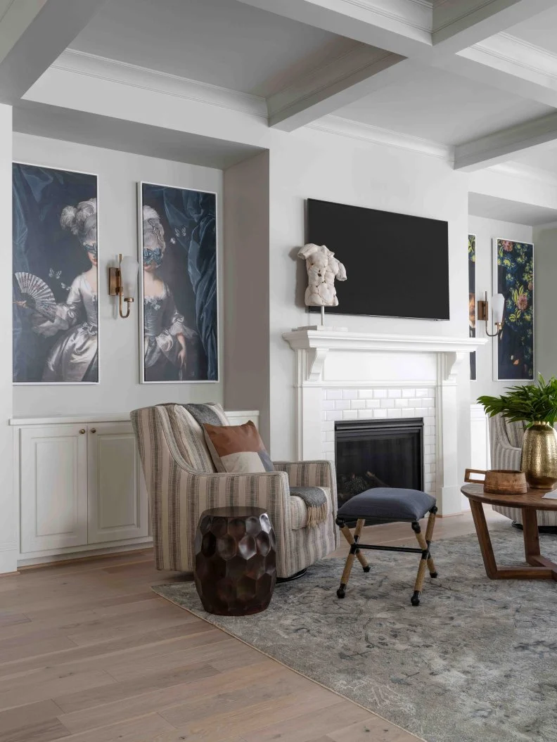 A soft and warm gray paint was used for the living room’s ceiling and walls. The trim includes a classic soft white with a touch of warmth, that adds dimension to the space.