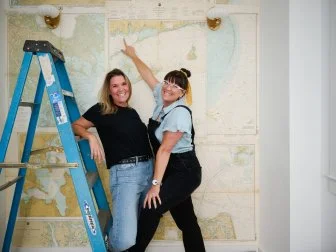As seen on HGTV’s Rock the Block, team Lyndsay and Leslie in front of their foyer design.