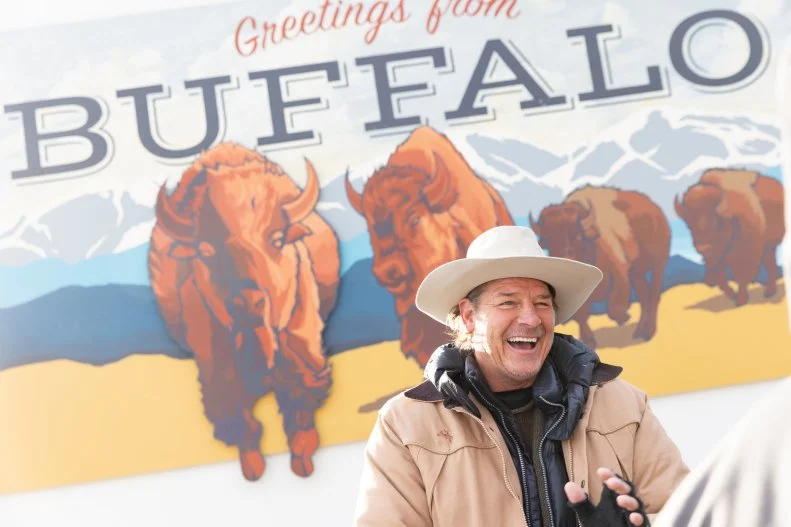 As seen on HGTV’s Home Town Kickstart, host Ty Pennington in front of the new mural in Buffalo, Wyoming. (Portrait Ty Pennington)
