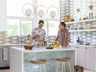 Midcentury Modern Kitchen With Multicolor Hex Tiles and Brass Lighting
