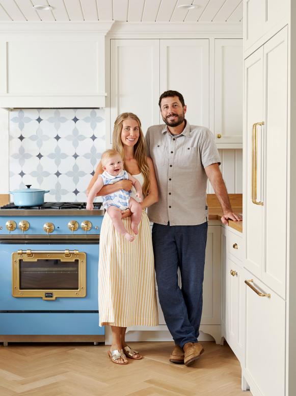 Family Portrait in Front of Patterned Backsplash and Blue Oven