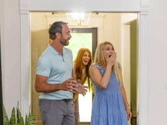 the Jardines reaction to their new living room reveal after renovation, as seen on No Demo Reno.