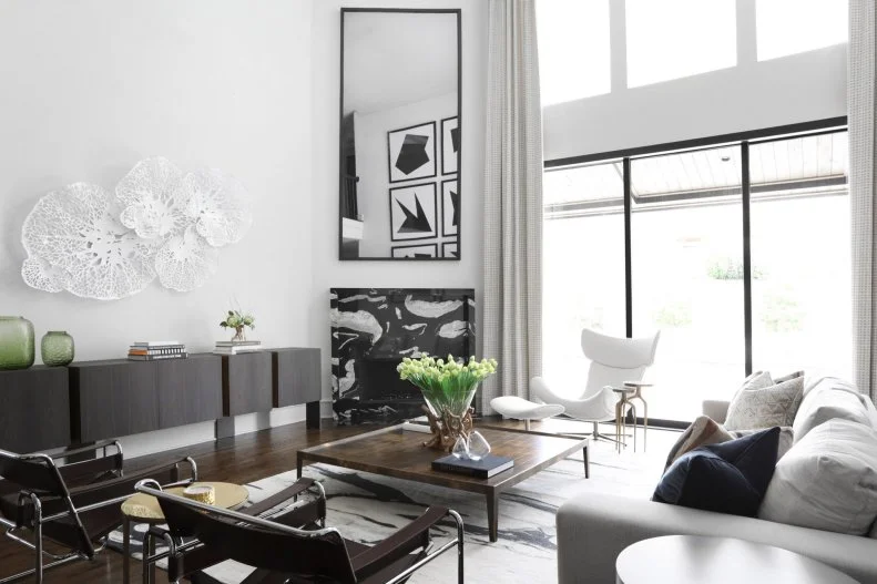Marble Fireplace in Monochromatic Living Room With Square Coffee Table