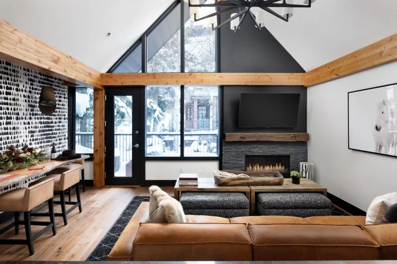 Contemporary Living Room With Vaulted Ceiling and Large Windows 