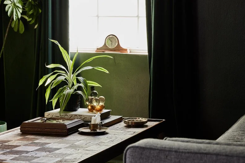 Living Room With Wooden Check Coffee Table, Green Curtains
