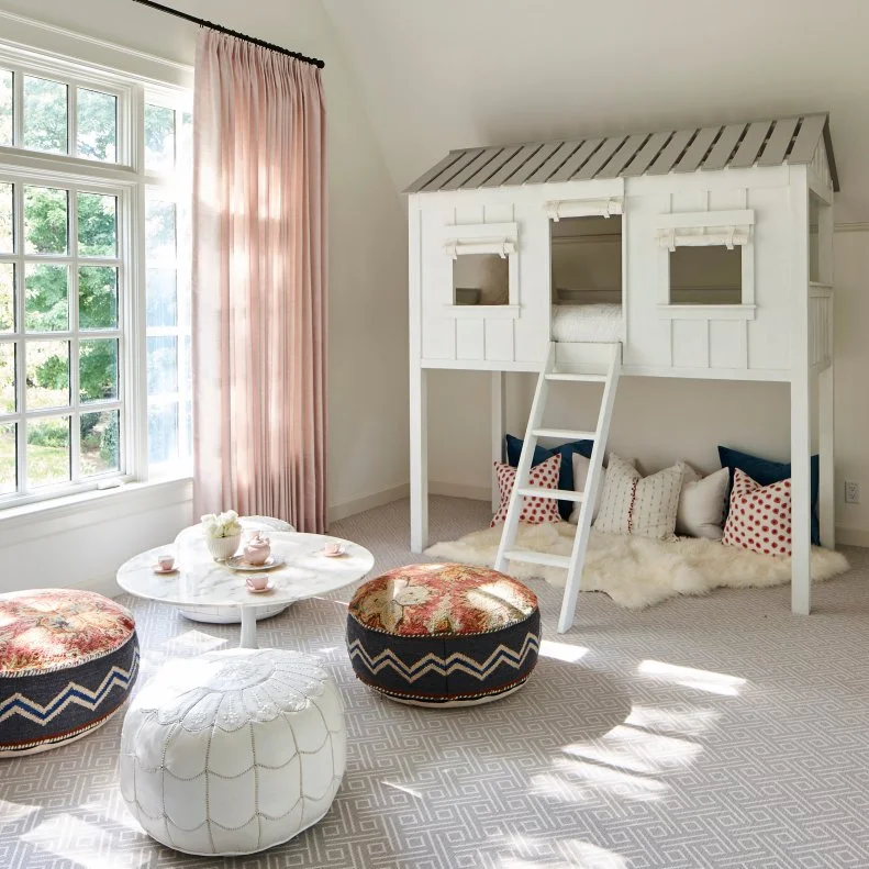 Kid's Bedroom With Bunk Bed and Table