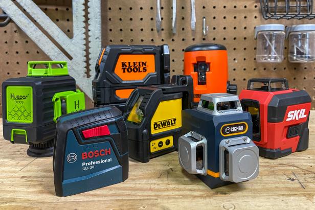 Assorted Laser Levels on a Work Bench